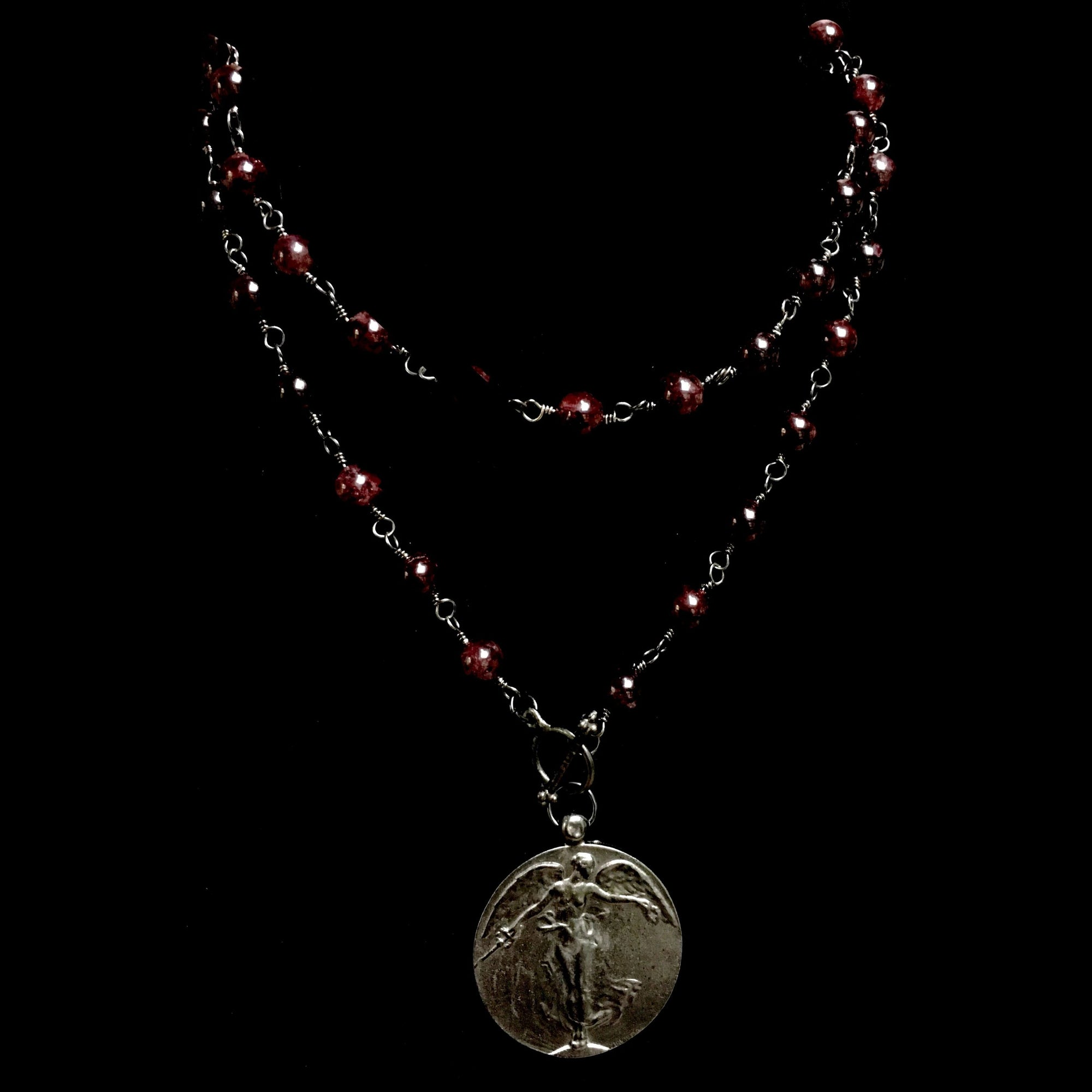 Garnet Peace Angel with Toggle Front in Gunmetal Necklace by Whispering Goddess