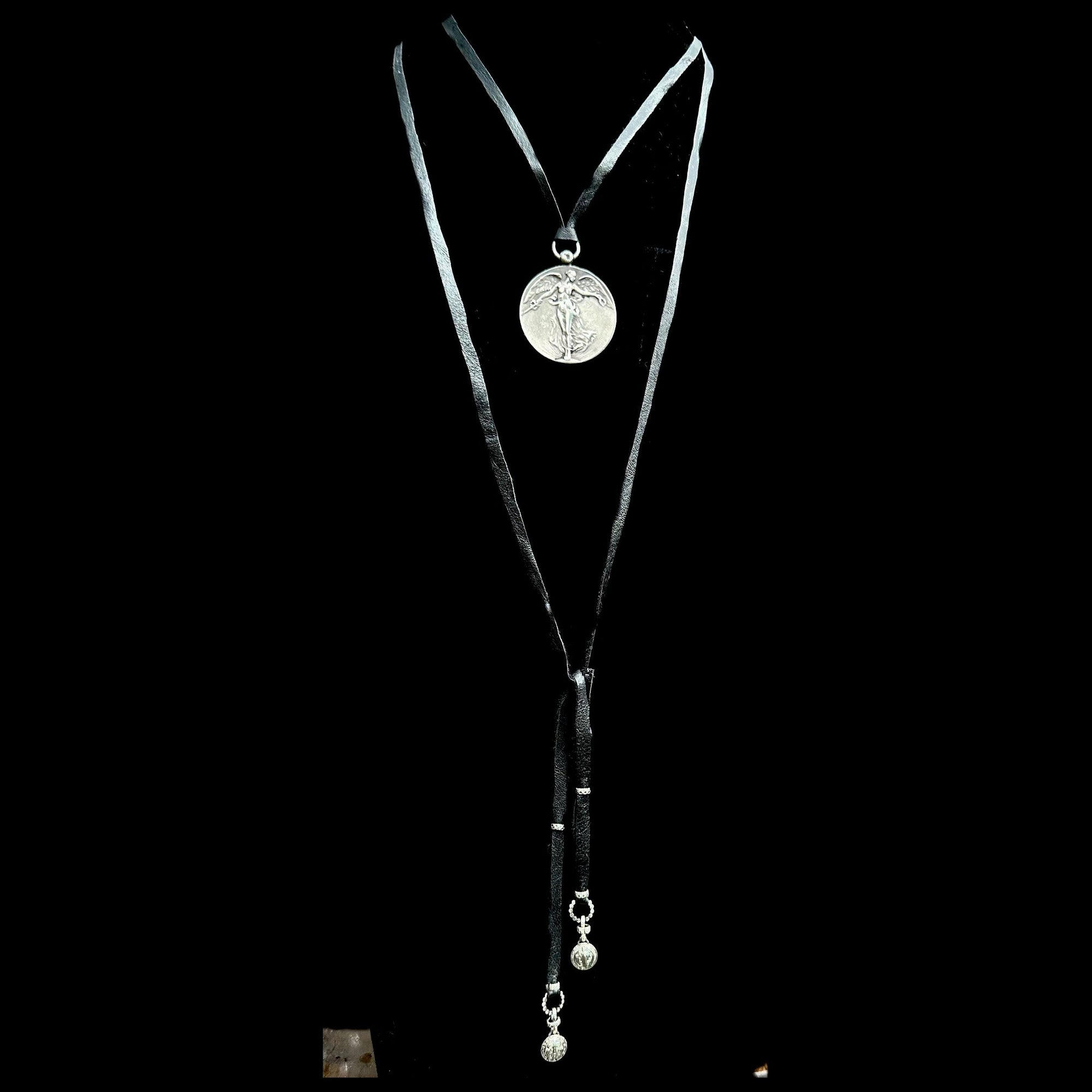 The Peace Angel Necklace in Black Deerskin