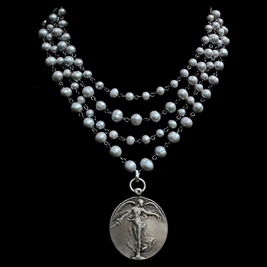 Moonglow Sophia Freshwater Pearl Peace Angel Necklace in Silver
