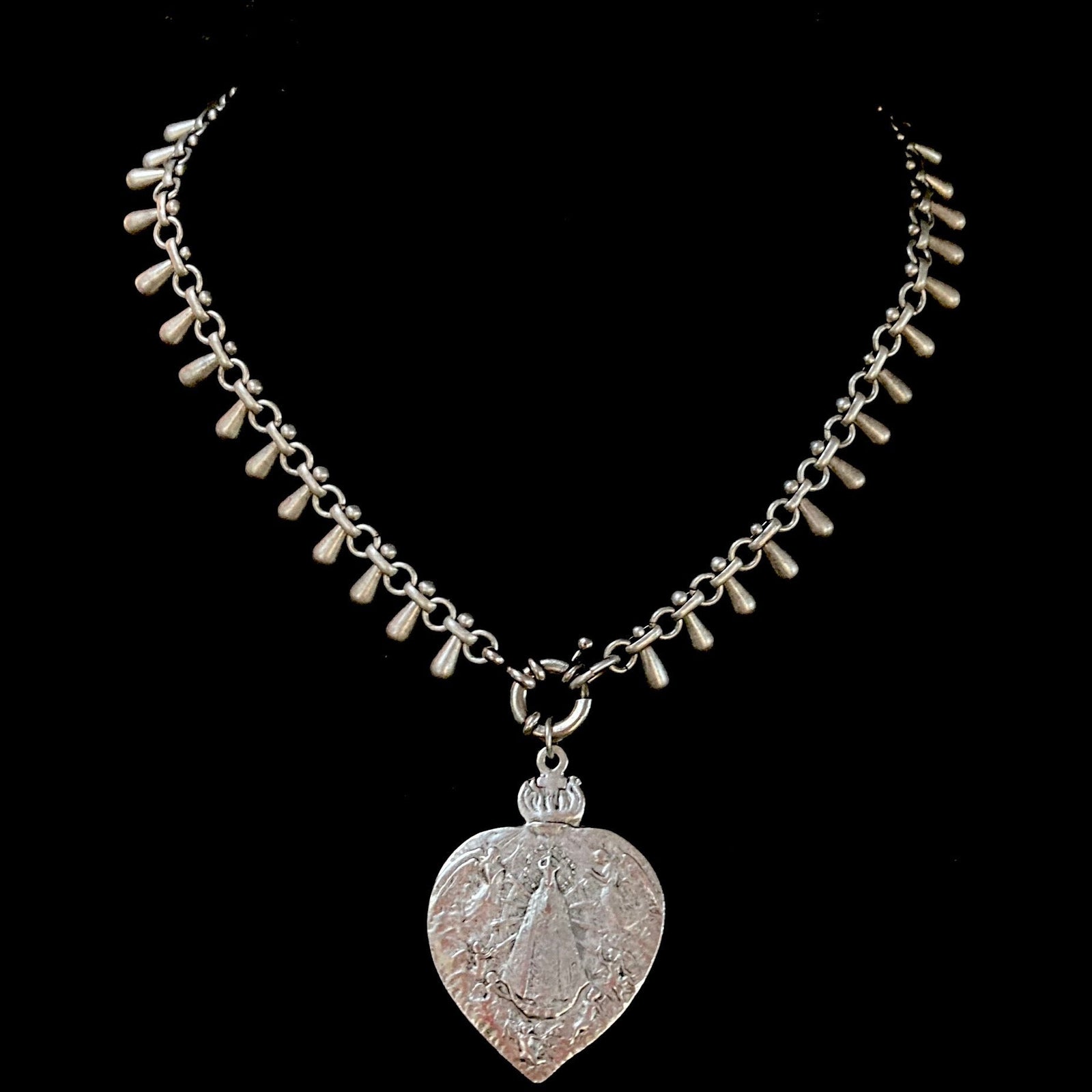 Lady of Lujan Feather Necklace in Silver by Whispering Goddess