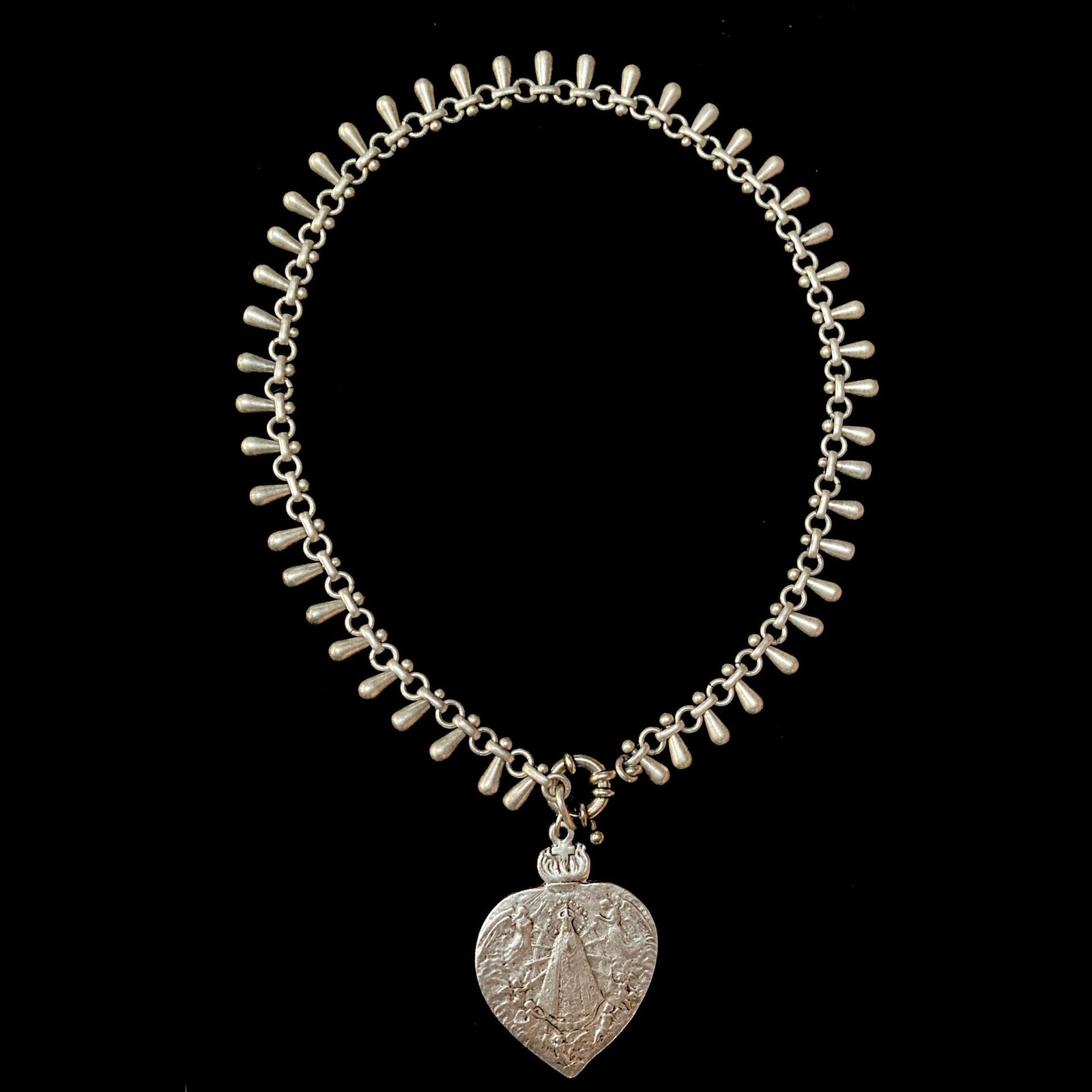 Lady of Lujan Feather Necklace in Silver by Whispering Goddess