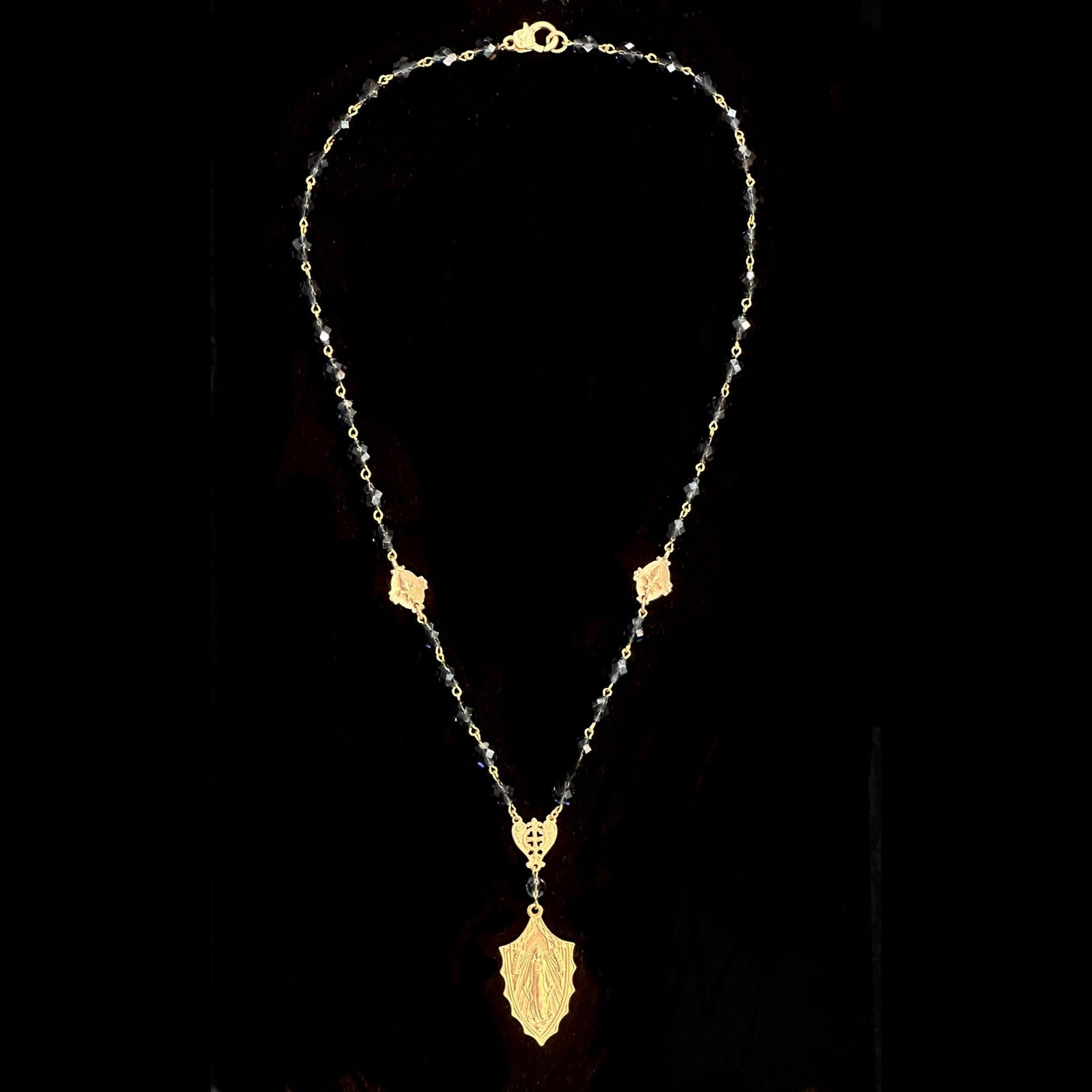 Montana Sapphire Madonna with Fleur de Lis in Gold